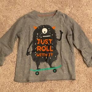 Carter’s long sleeve T-shirt, 18 months. Monster skateboard.